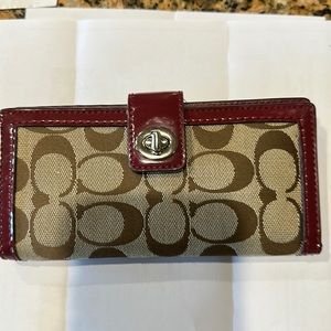 Coach checkbook wallet Tan with Burgundy accent. New